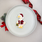 Gans im Weihnachtsmannkostüm