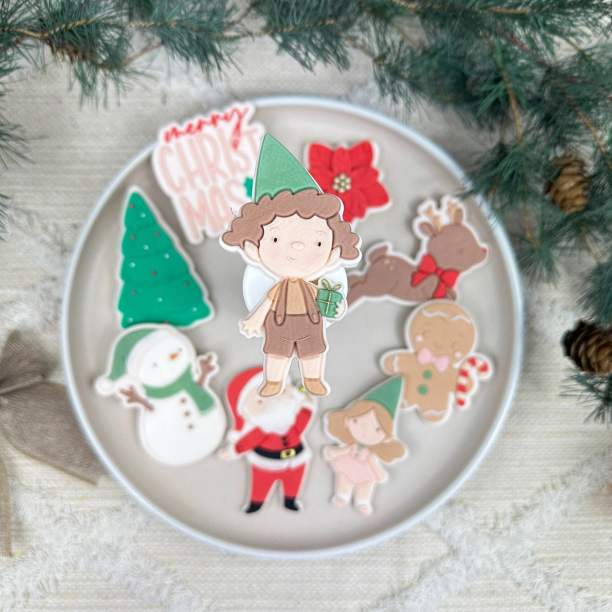 Wichteljunge mit Geschenk